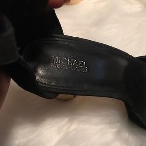 Black and gold size 10 Michael Kors shoes